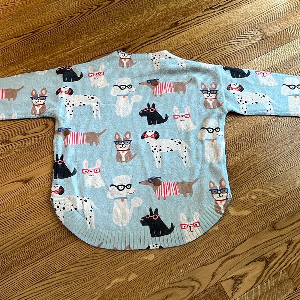 Puppy sweater size medium.